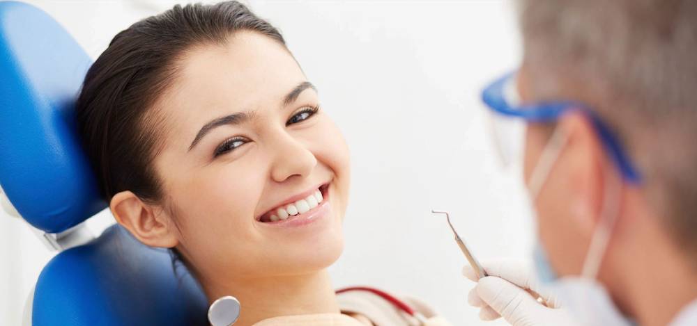 Female patient smiling in dentistry